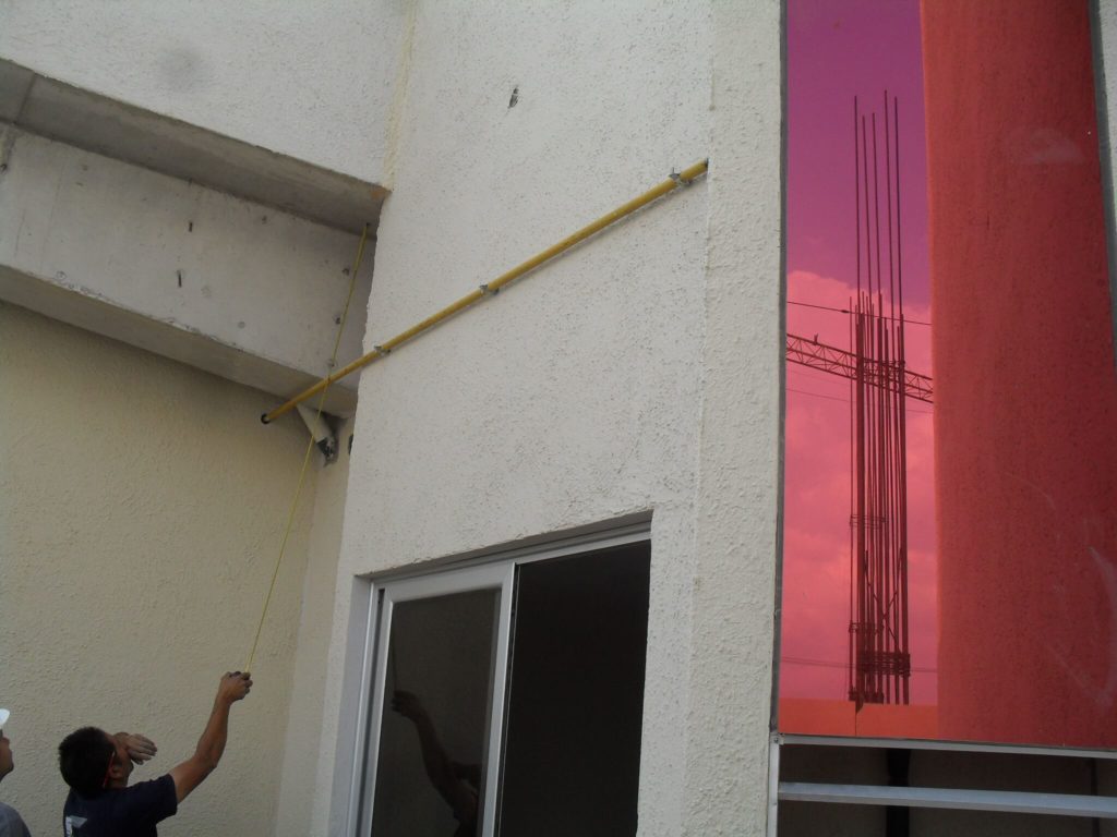 Las Gemas - Vista exterior del edificio con acabados de fachada